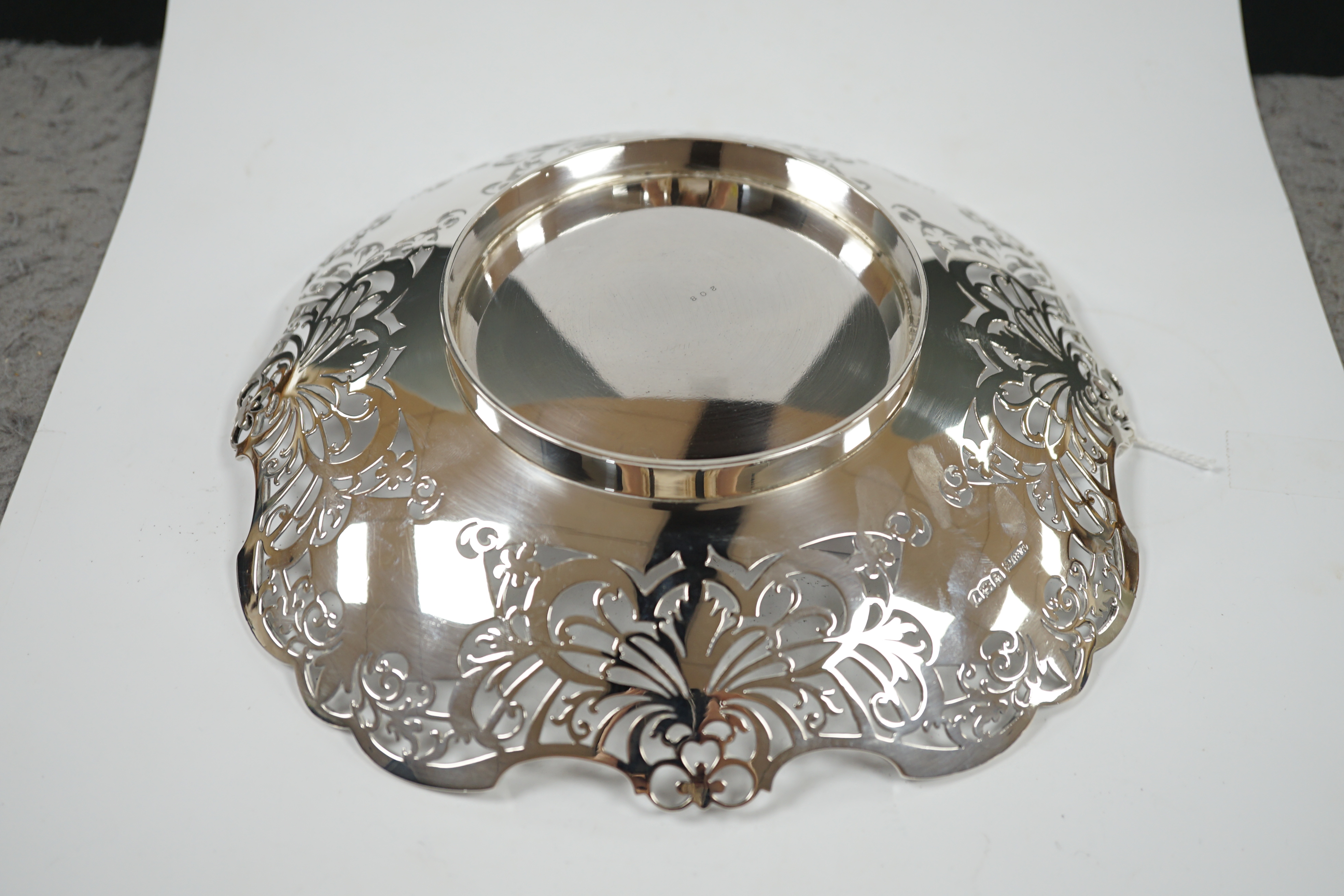 A George VI pierced silver shallow dish, by Collingwood & Sons Ltd, Sheffield, 1938, 23.3cm, 13.5 oz. Condition - fair